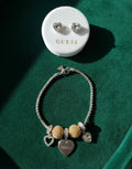 Pulsera con aretes Guess
