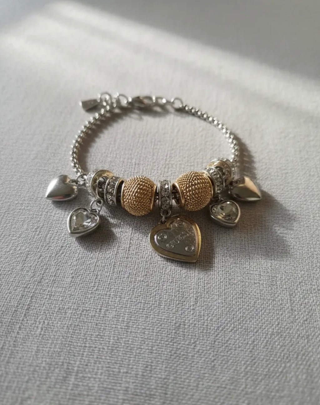 Pulsera con aretes Guess